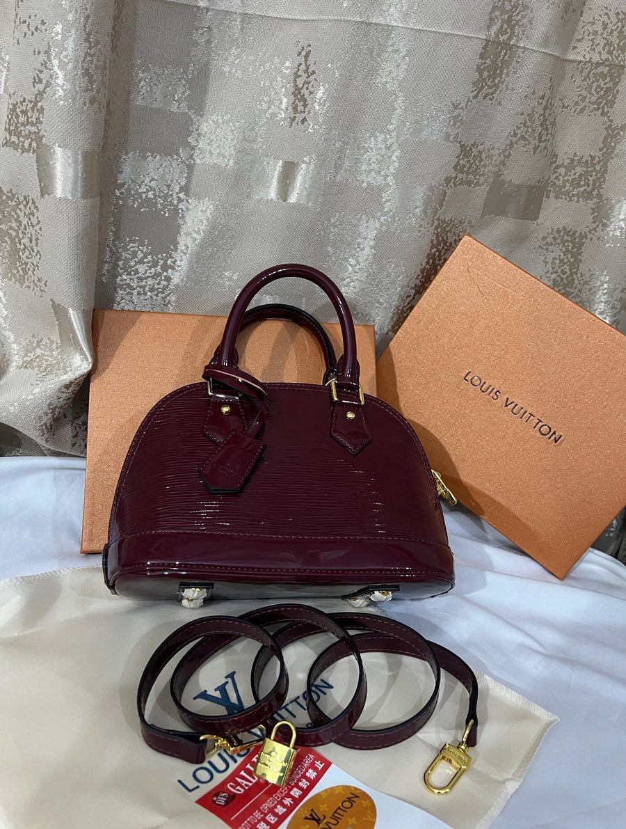 Louis Vuitton Sac à main Alma BB bordeaux – image 2
